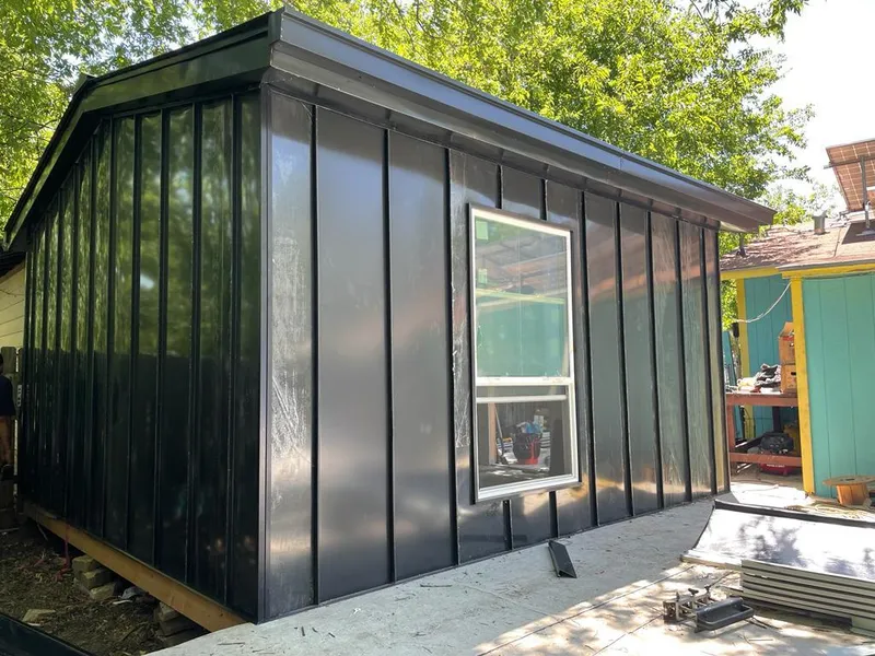 Black standing seam metal wall panels for Roof Inspection in Horseshoe Bay